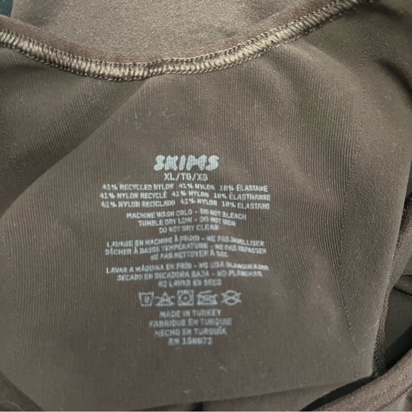 SKIMS Seamless Sculp Scoop Neck Thong Bodysuit in Cocoa - Picture 12 of 12